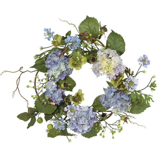 10% Plastic Vickerman 16 Artificial Blue Hydrangea Wreath 60% Polyester This Hydrangea Wreath Features a Blend of Light and Dark Blues with a hint of Green 20% Grapevine 